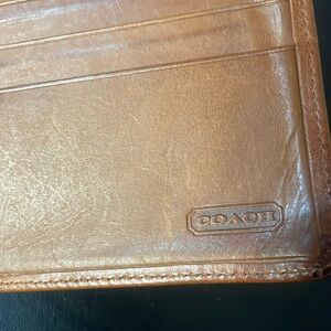 Used men’s leather Coach wallet.